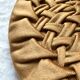 Round vintage cushion in pleated velvet
