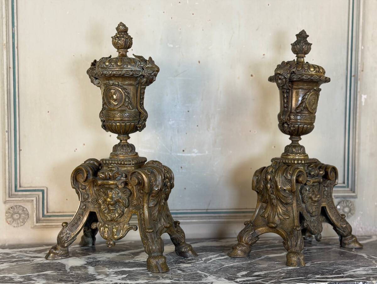 Pair of Louis XIV style andirons in bronze after a design by André-Charles Boulle.