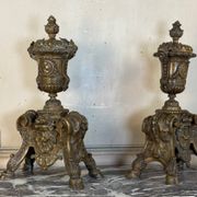 Pair of Louis XIV style andirons in bronze after a design by André-Charles Boulle.