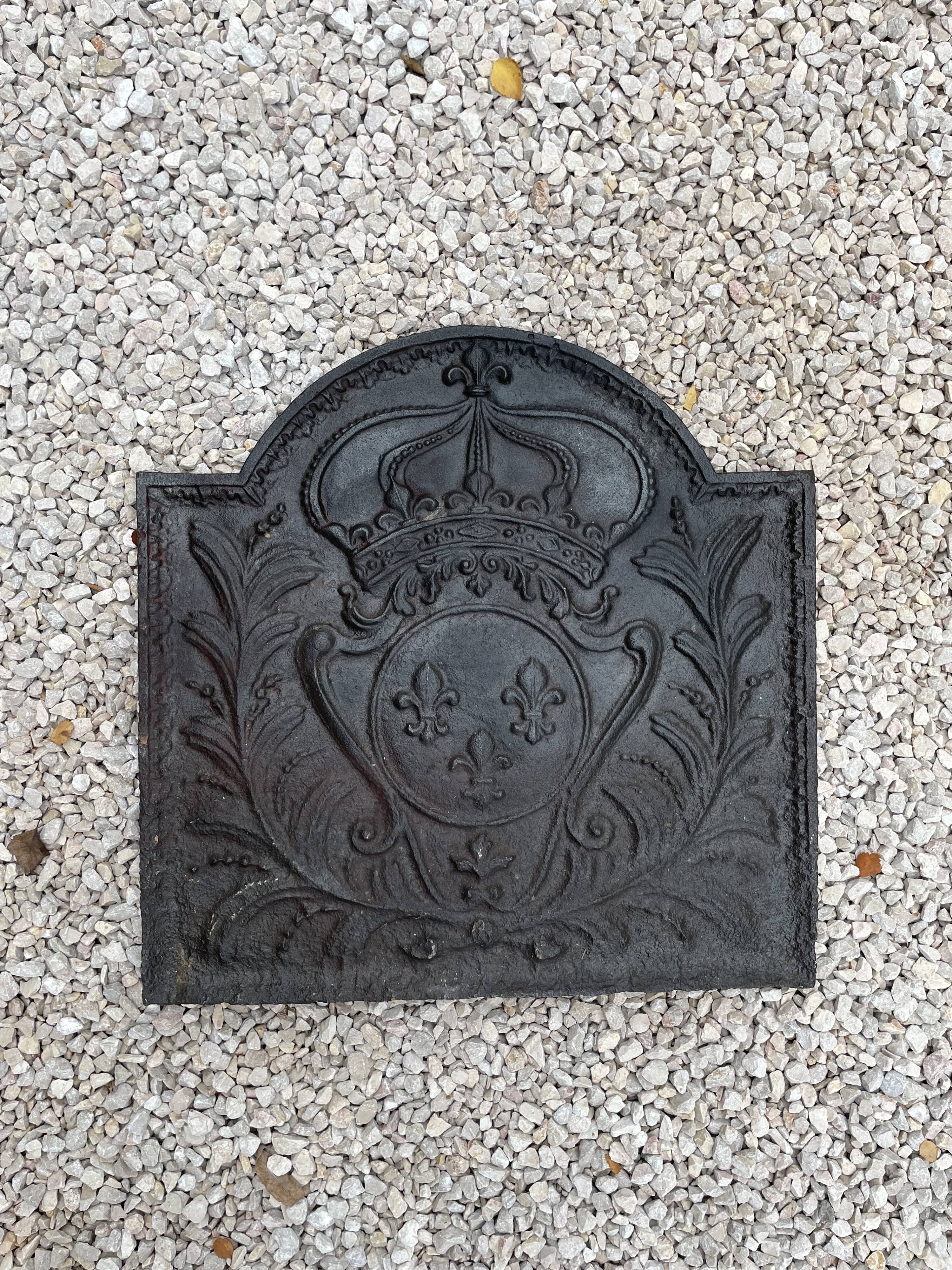 Old cast iron fireplace plate