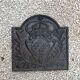 Old cast iron fireplace plate