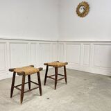 A pair of 1950s straw stools.