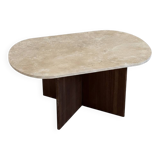 Oval coffee table in travertine and dark oak.