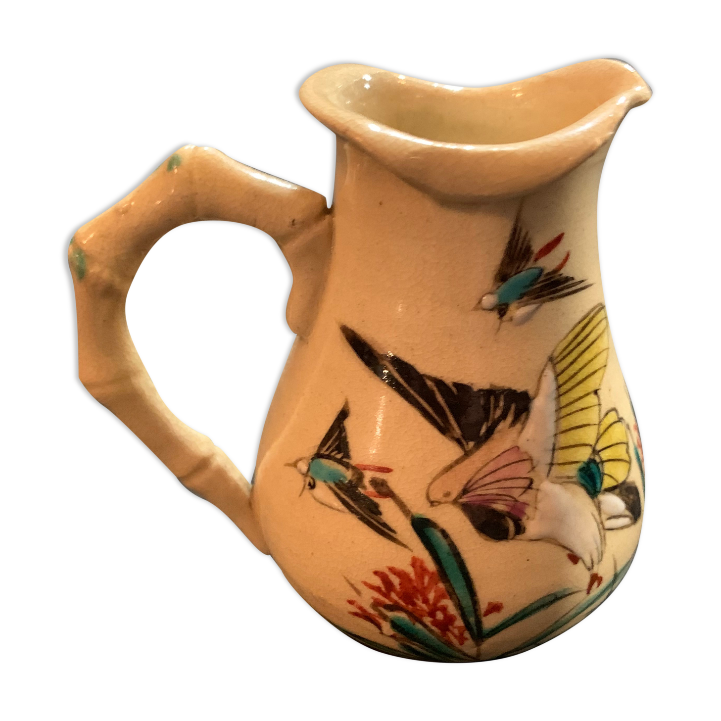 Enamelled porcelain pitcher