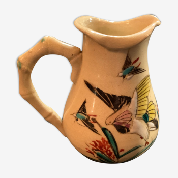 Enamelled porcelain pitcher