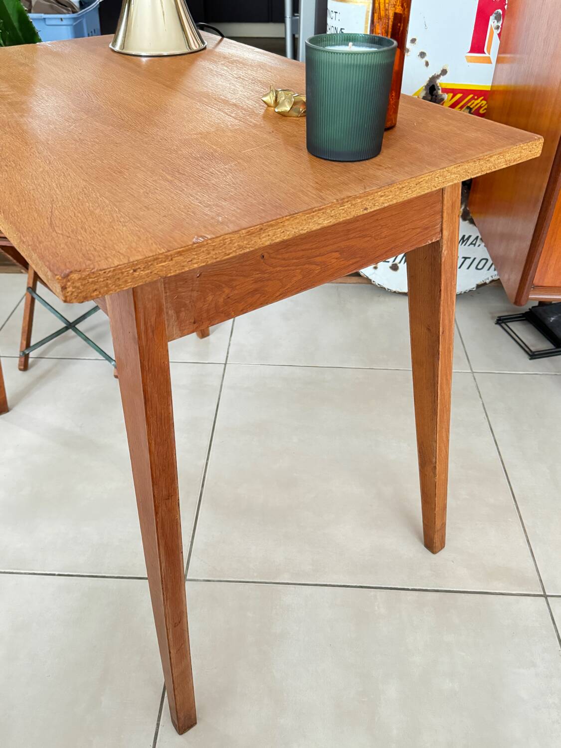 Old wooden desk or side table with compass legs