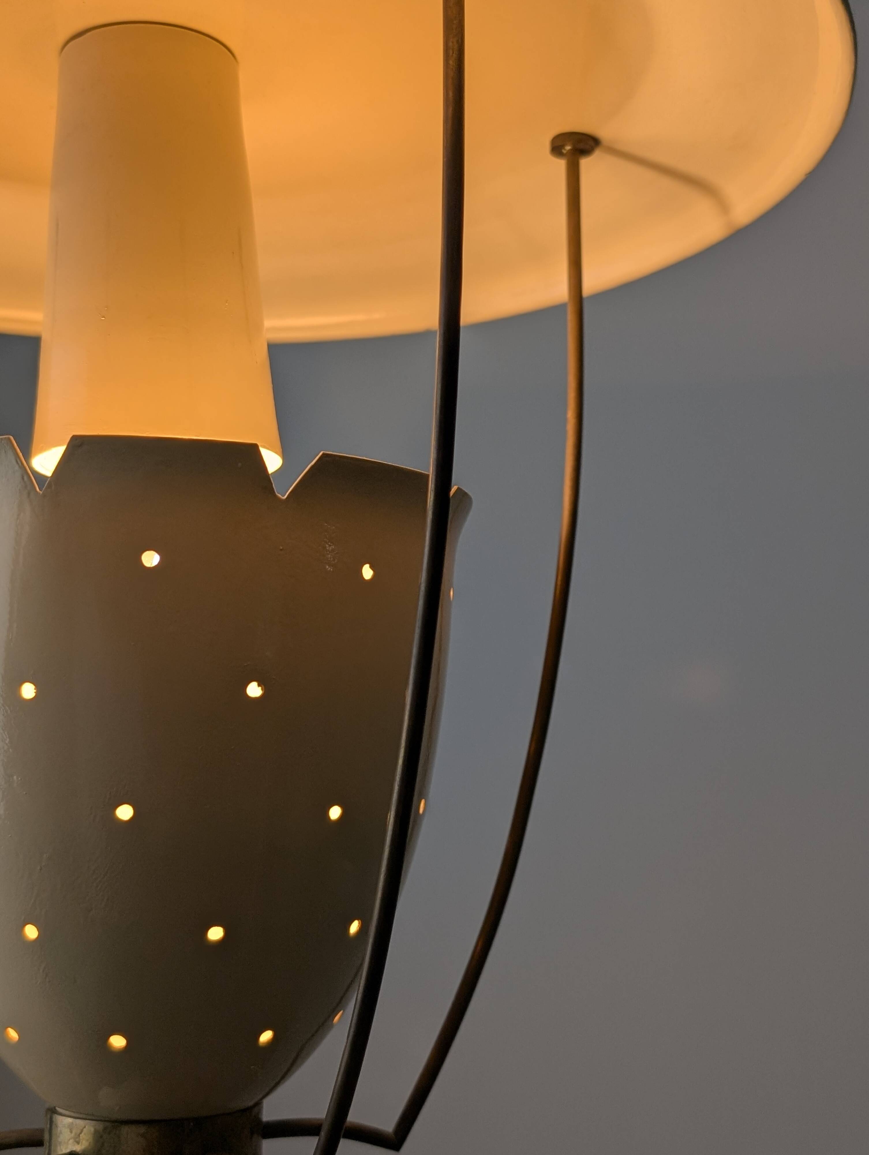Perforated metal pendant lamp with brass details, Italy, 1940s