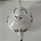 Porcelain teapot with rose patterns