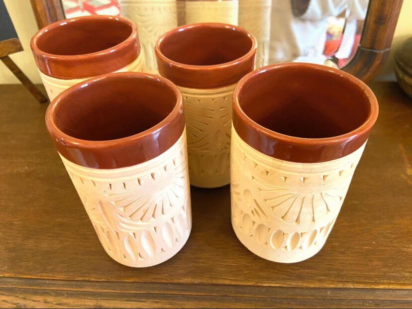 Four hand-sculpted ceramic glasses