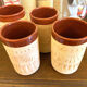 Four hand-sculpted ceramic glasses