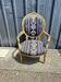 Gold cabriolet armchair in Neo-Directory style