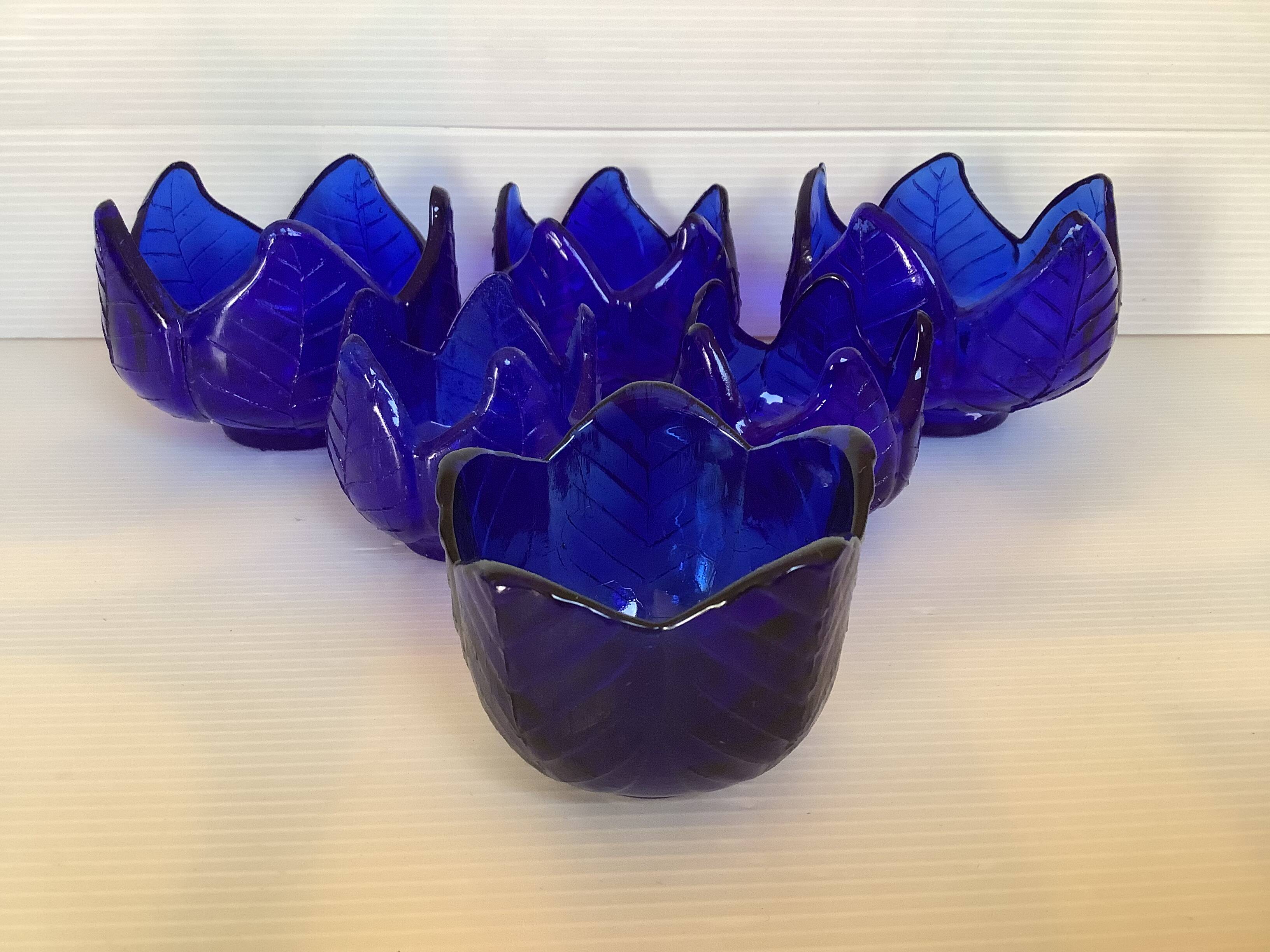 Six stackable cobalt blue candlesticks