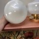 Pair of white opaline globe wall lights