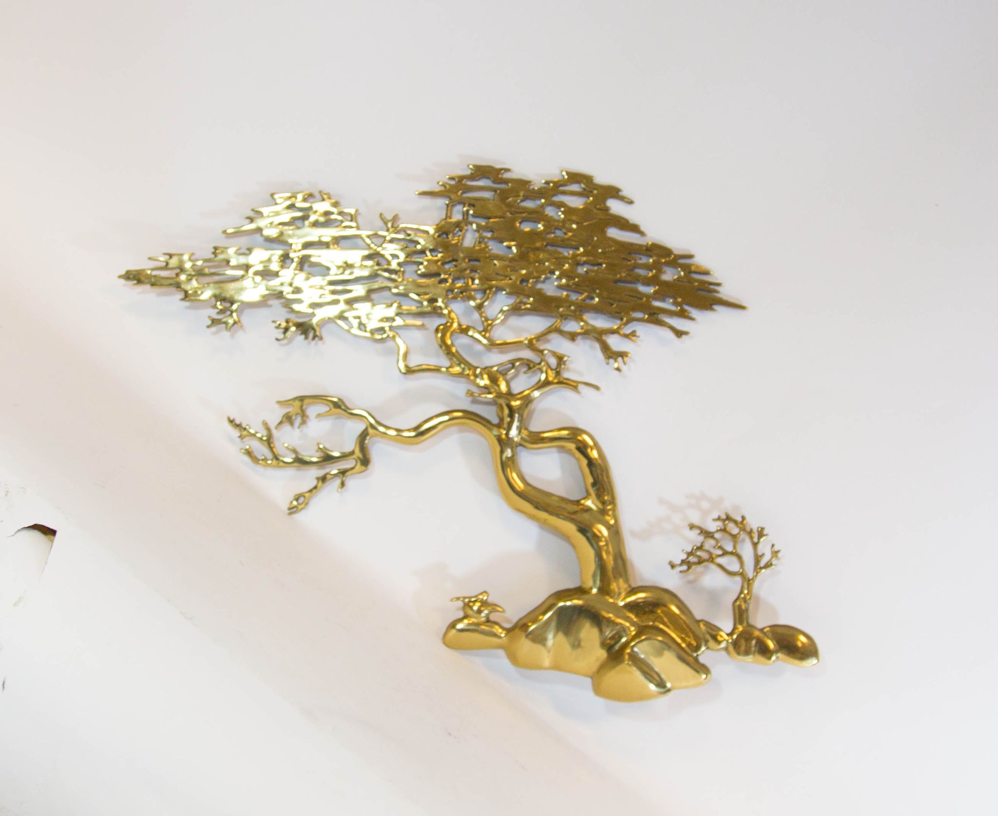 Brass wall sculpture