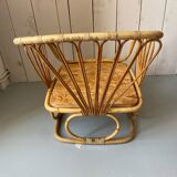 Pair of leather and bamboo armchairs