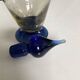 Vintage carafe in blown and bubbled glass paste.