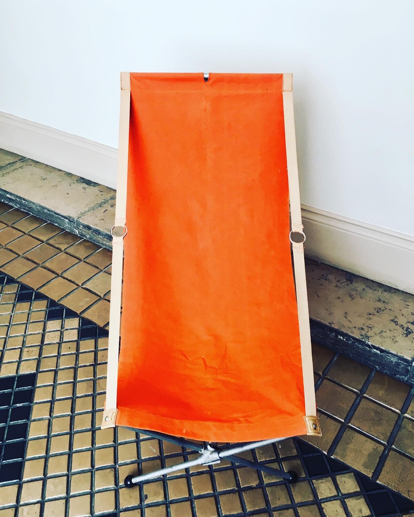 Orange detachable transamac seat circa 1955 by Lafuma
