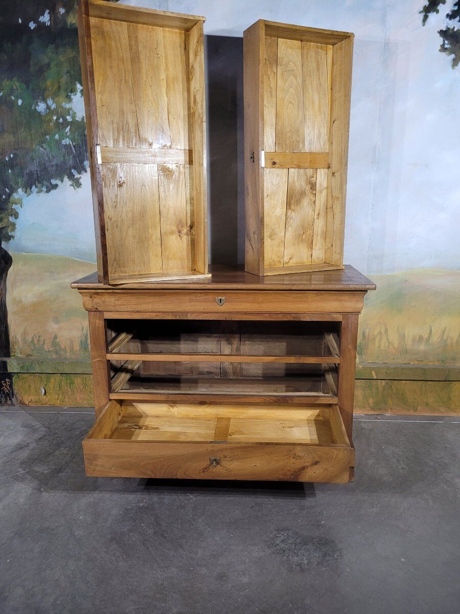 Louis Philippe period chest of drawers in solid walnut.