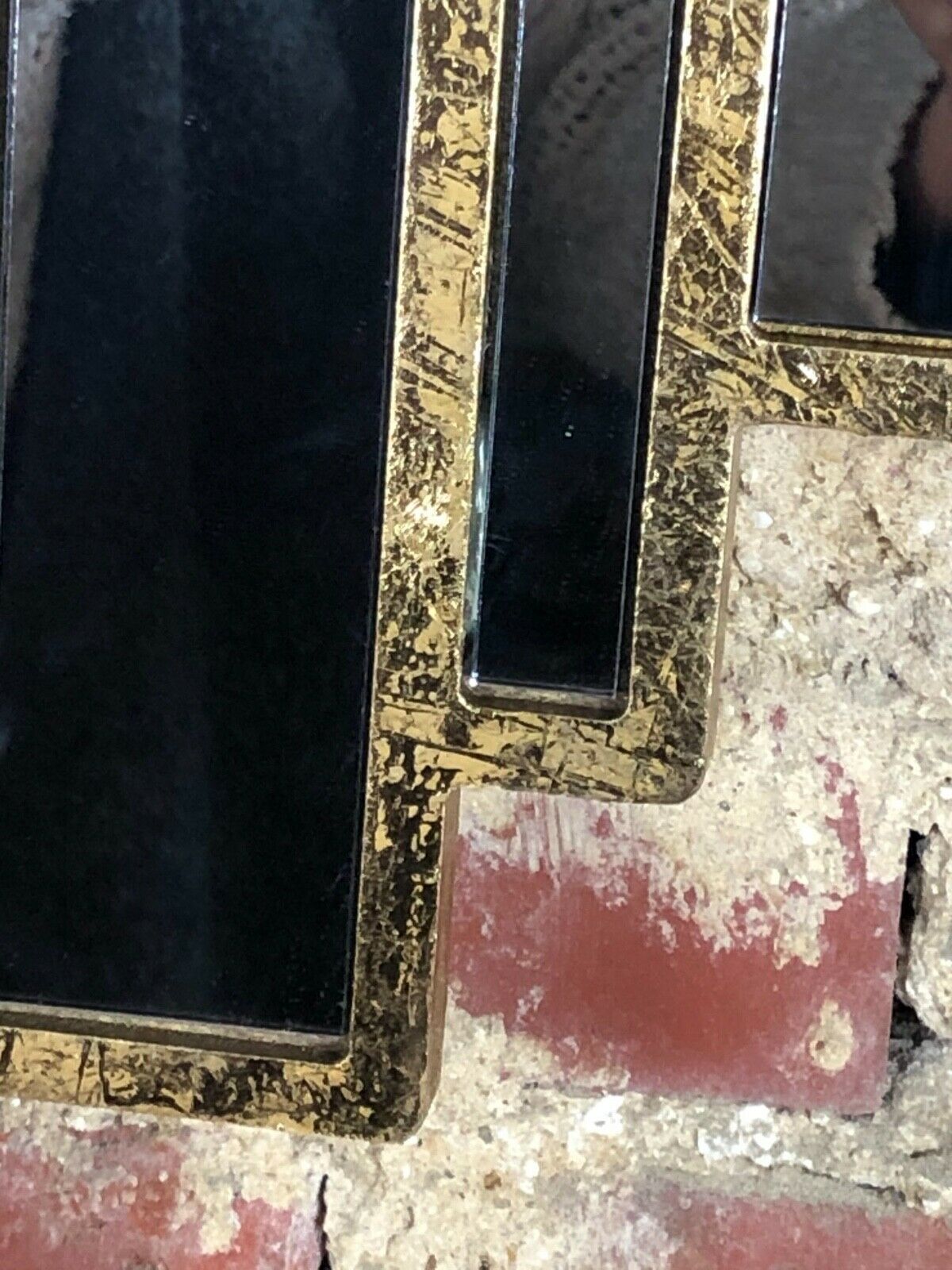 Art deco style "miami" mirror in patinated gilded wood 80x52cm