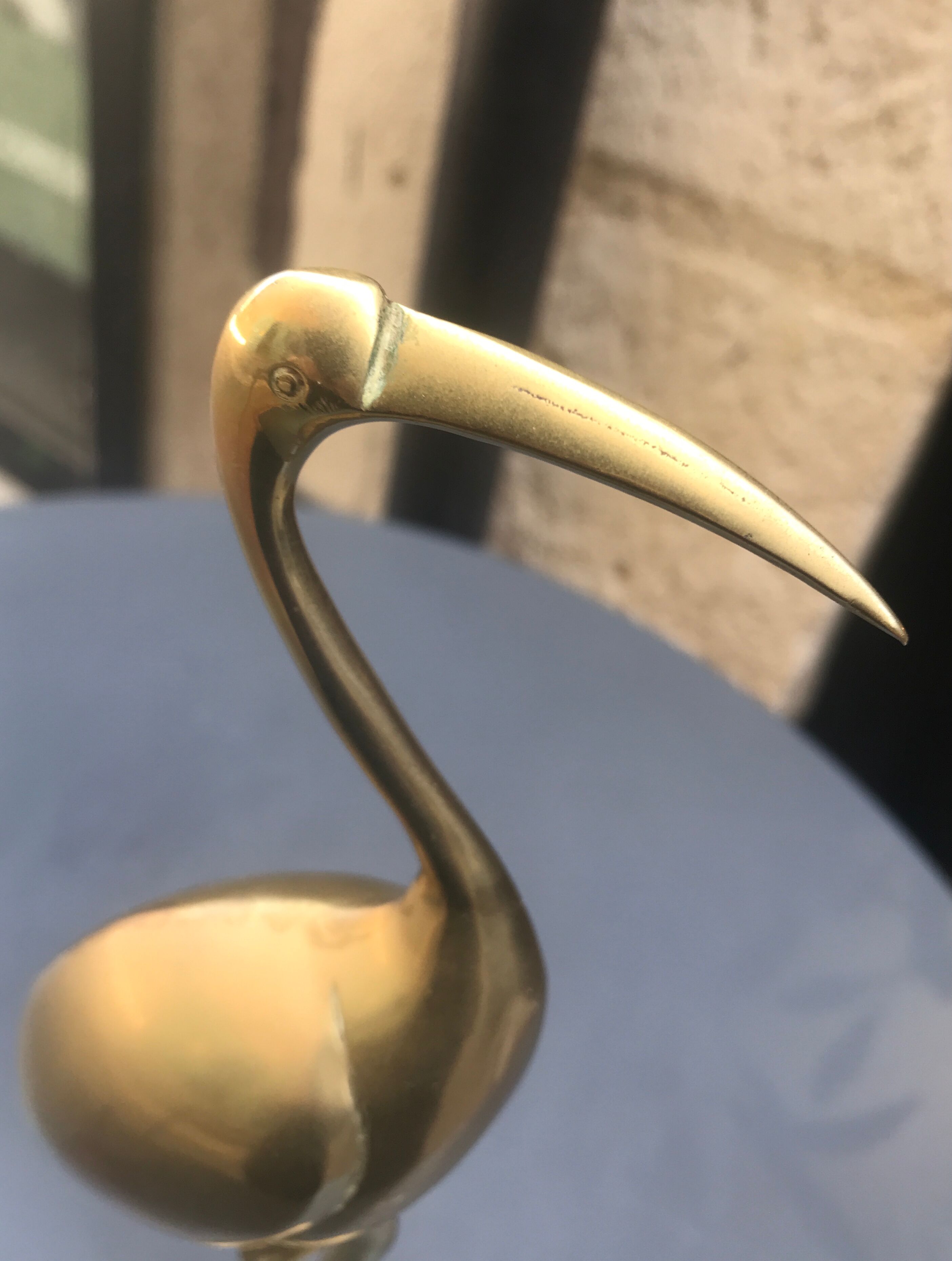 Large brass stilt walker