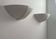 Pair of vintage matte white porcelain wall lights, France 1970.