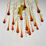 A pair of Mid Century 70's waterfall chandeliers. Murano glass amber drops. Paolo Venini style.