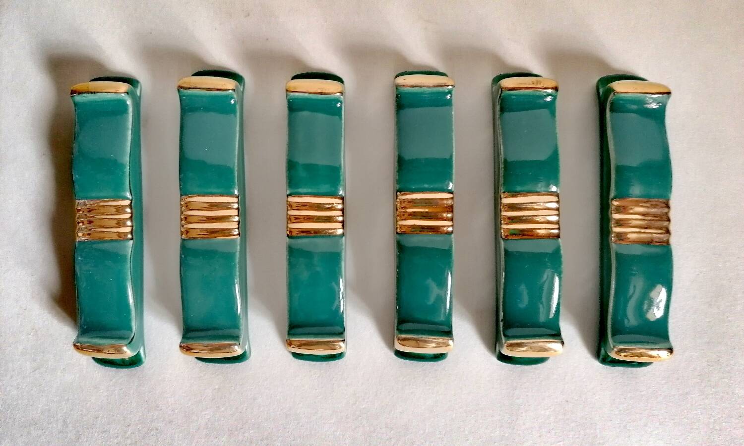 6 art deco knife holders from the 30s