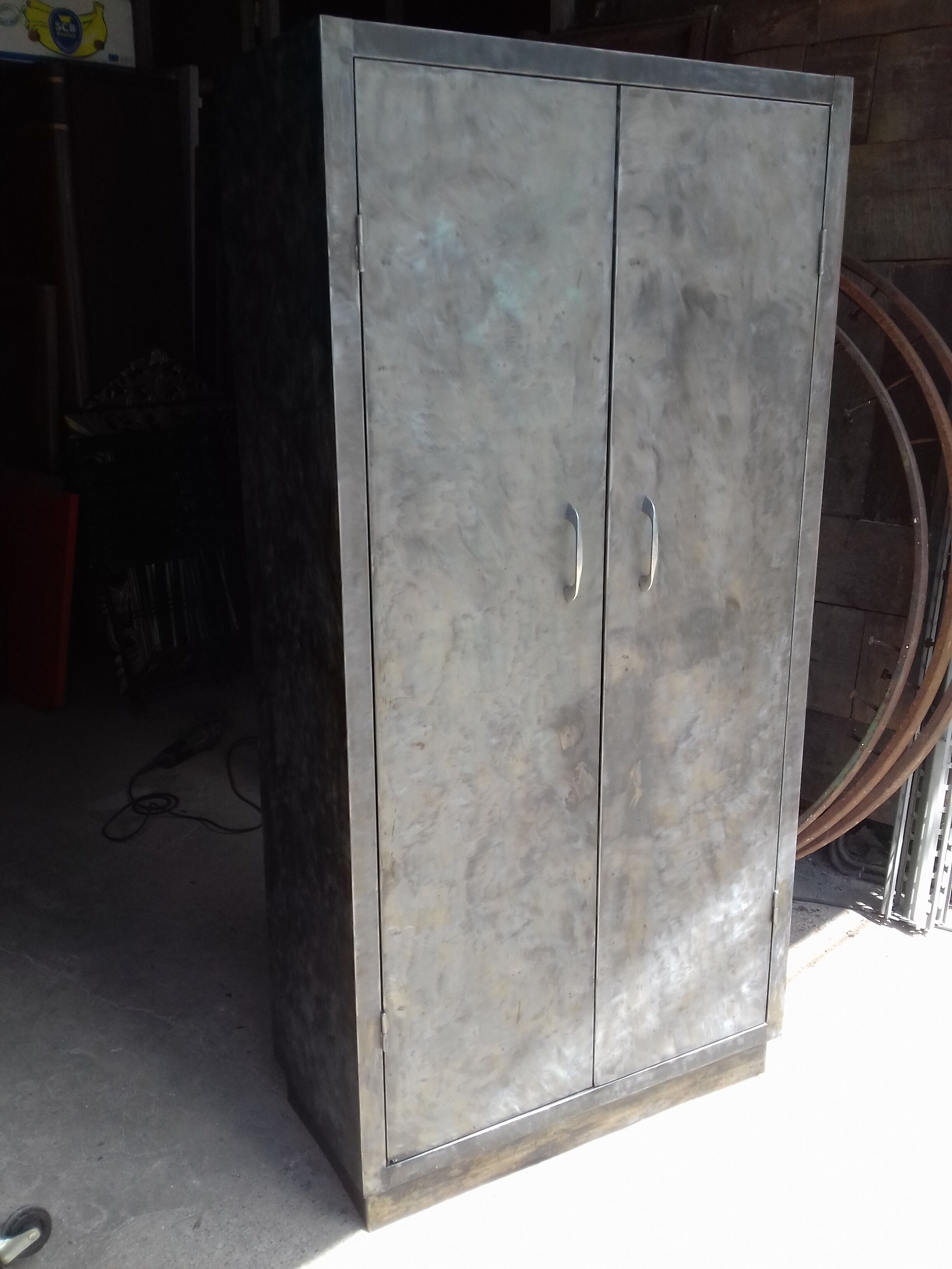 Polished varnished steel kitchen cabinet, circa 1950