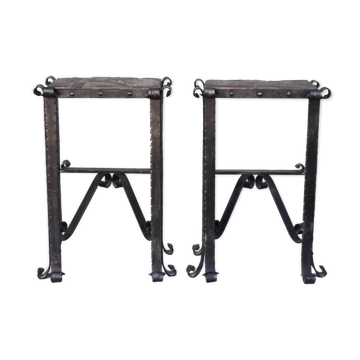 Pair of wrought iron and lava stone bedsides