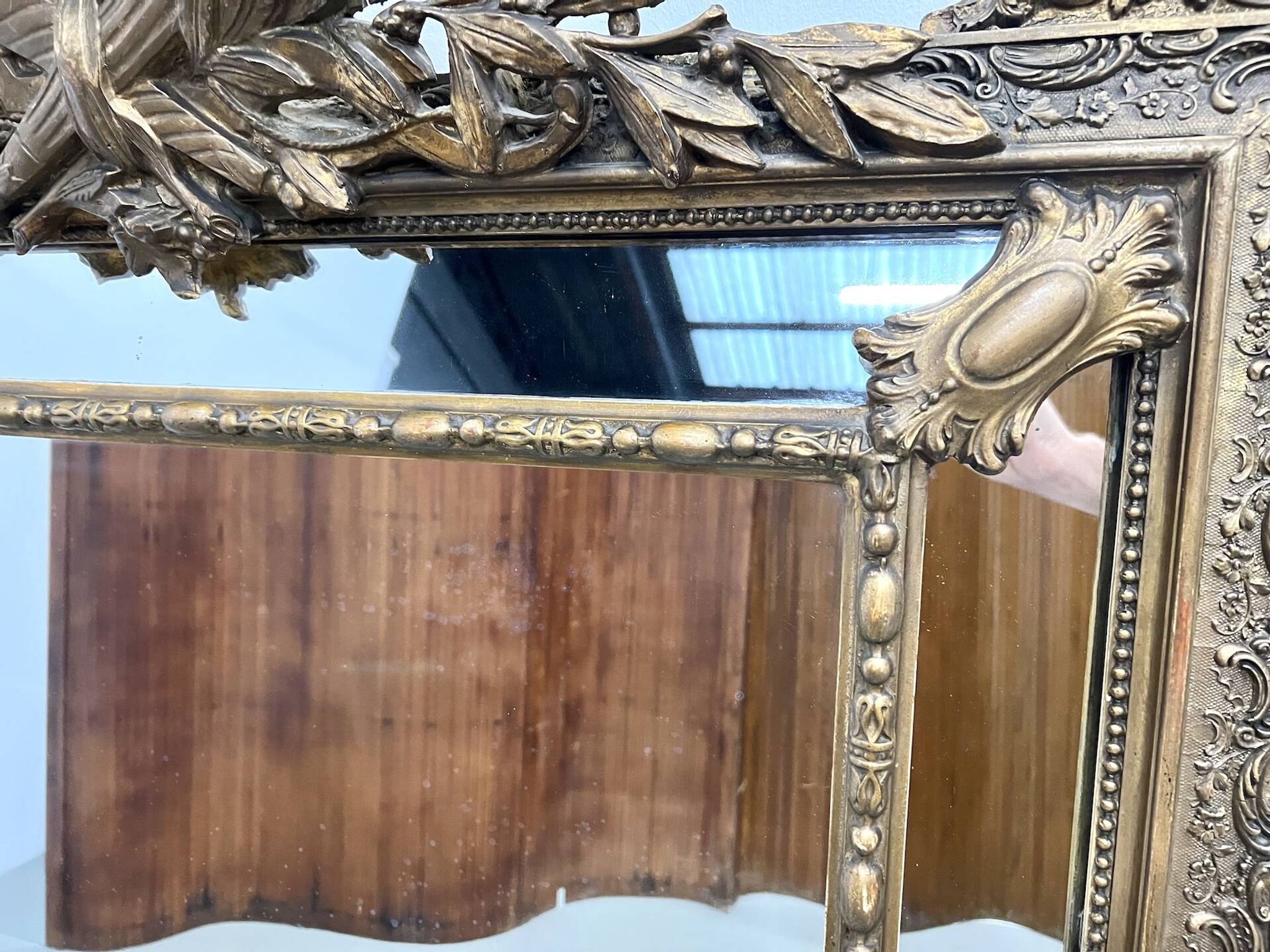 Large antique pediment mirror with mouldings.