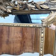 Large antique pediment mirror with mouldings.