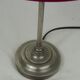 Lampe sur pieds ancienne rouge en laiton nickelé socle plomb