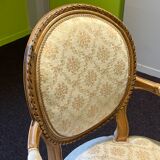Pair of Louis XVI style armchairs, in solid walnut, re-edged and upholstered, pegged