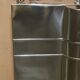 Art Deco fire screen from around 1920 in polished chrome with a bear.