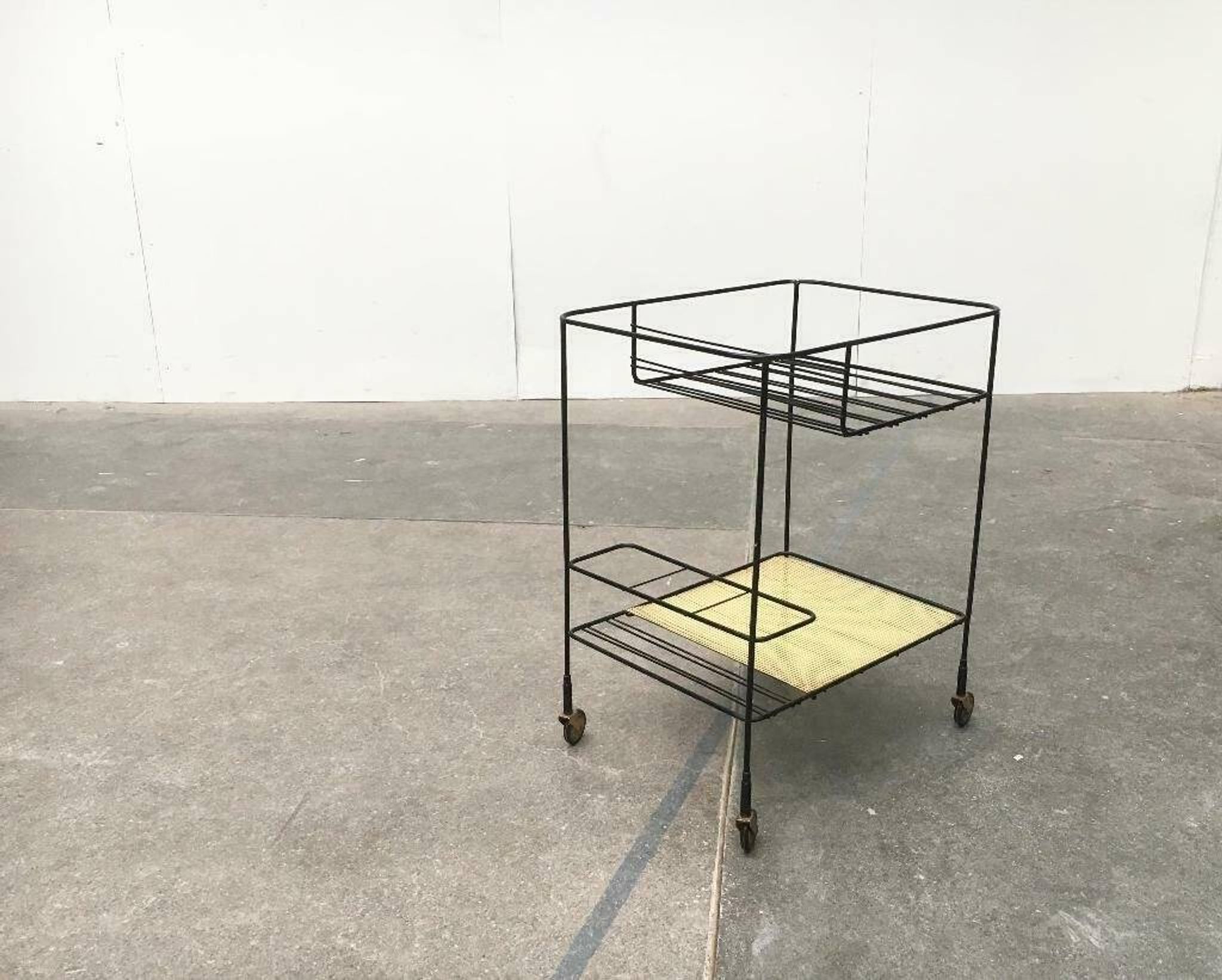 Minimalist perforated metal serving trolley in mid-century style, 1960s.