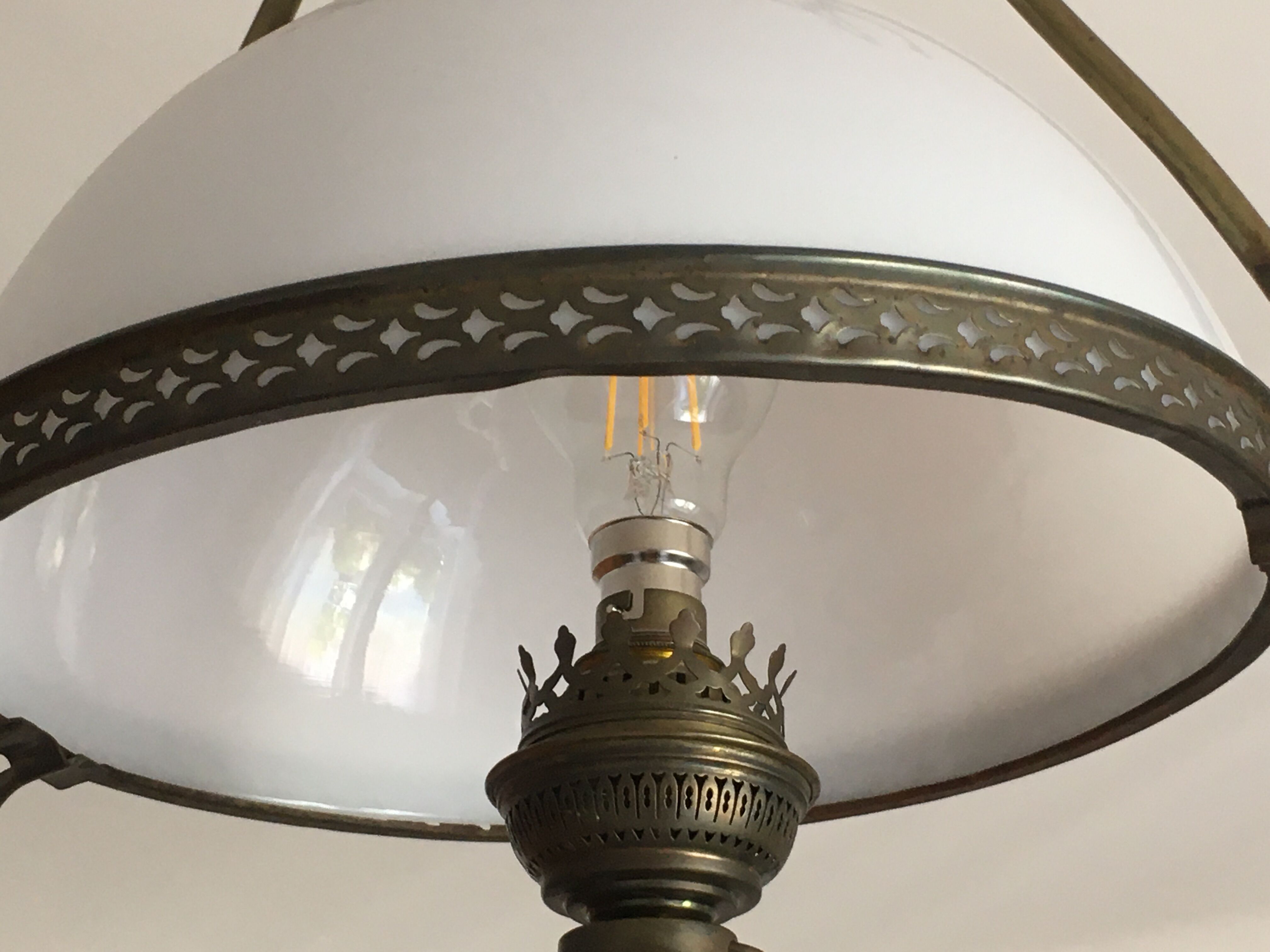 Brass and opaline oil lamp