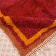 Minimalist burgundy cherry red shaggy berber rug