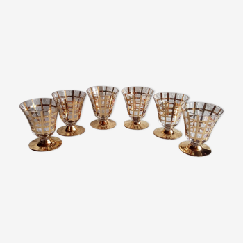 Suite of 6 golden glasses