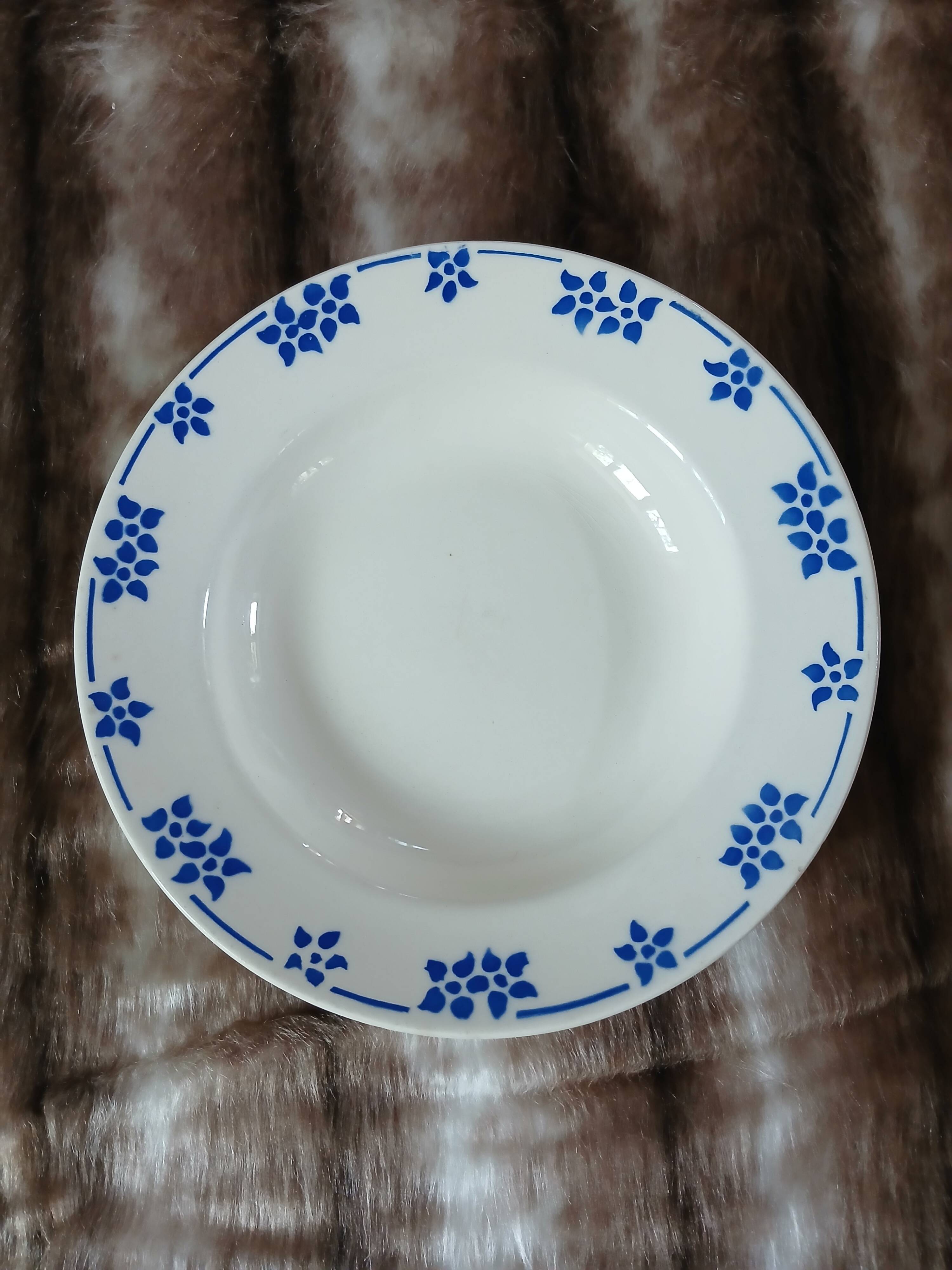 8 mismatched antique deep plates