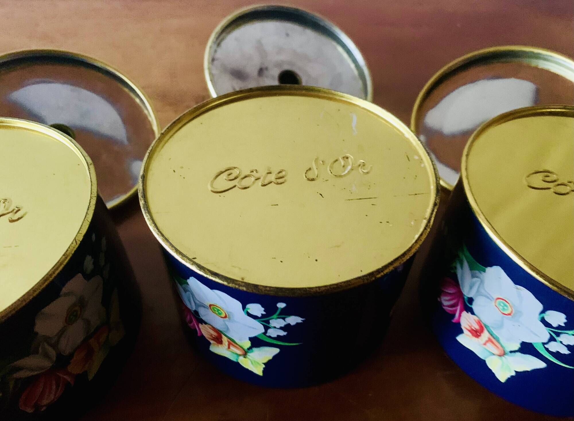 Trio of old Côte d'Or metal chocolate boxes - floral decoration