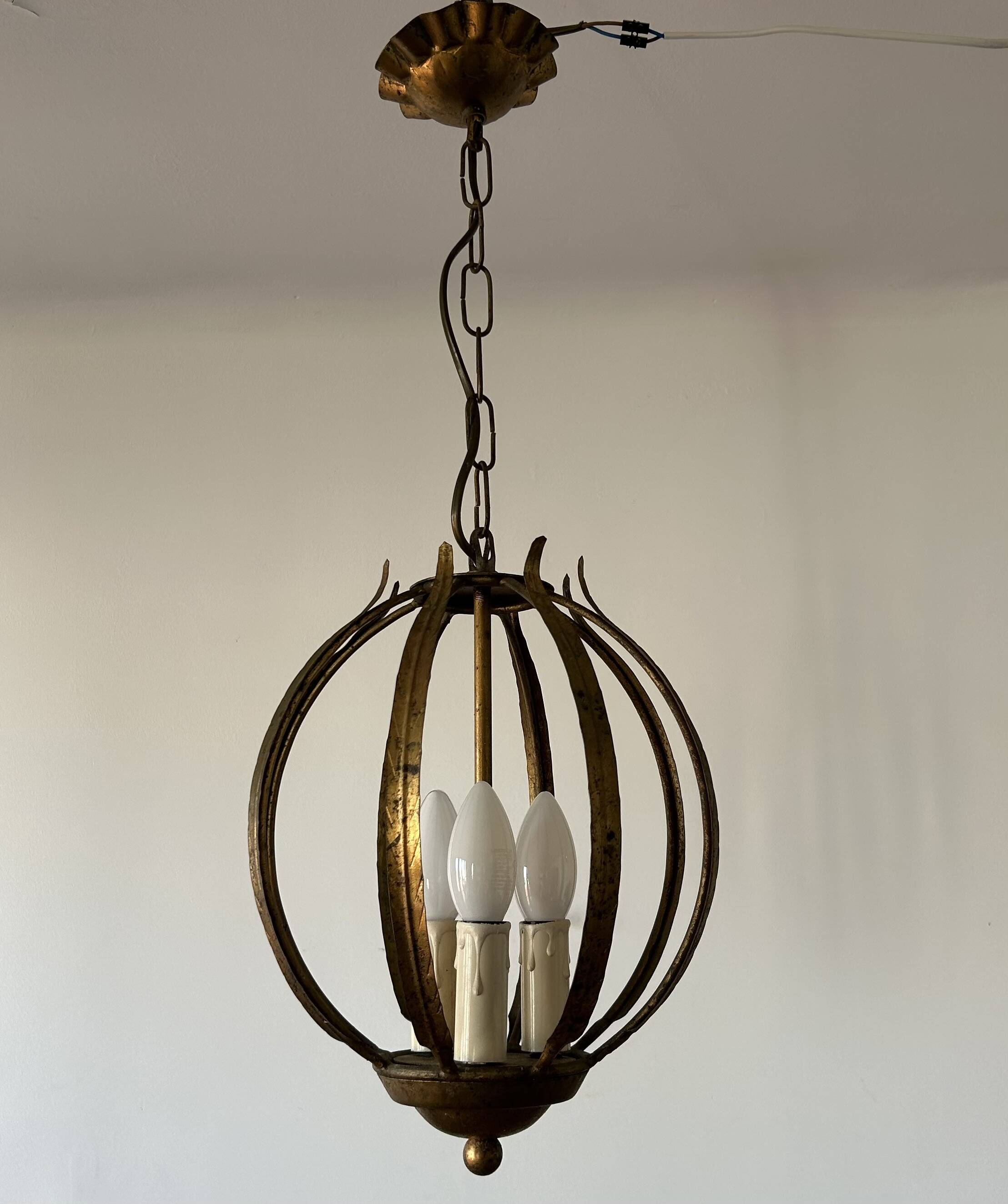 Chandelier, antique gold metal suspension.