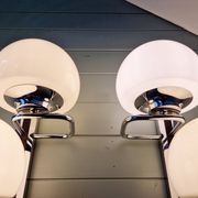 Pair of wall lights, G. Sciolari, in chrome metal and white opaline, 1970s