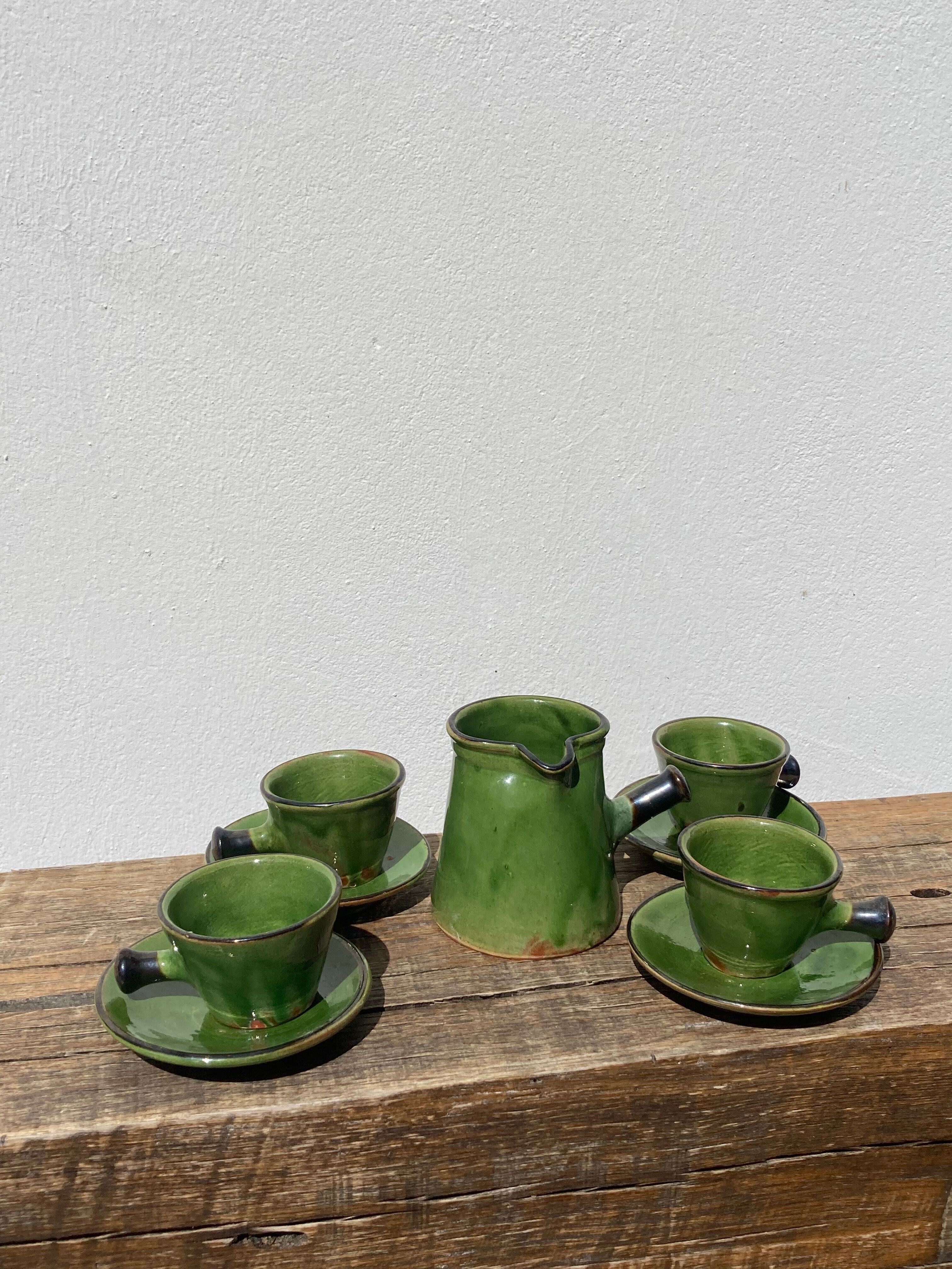 Coffee service signed Poterie de Marnaz including cups and pitcher in glazed terracotta