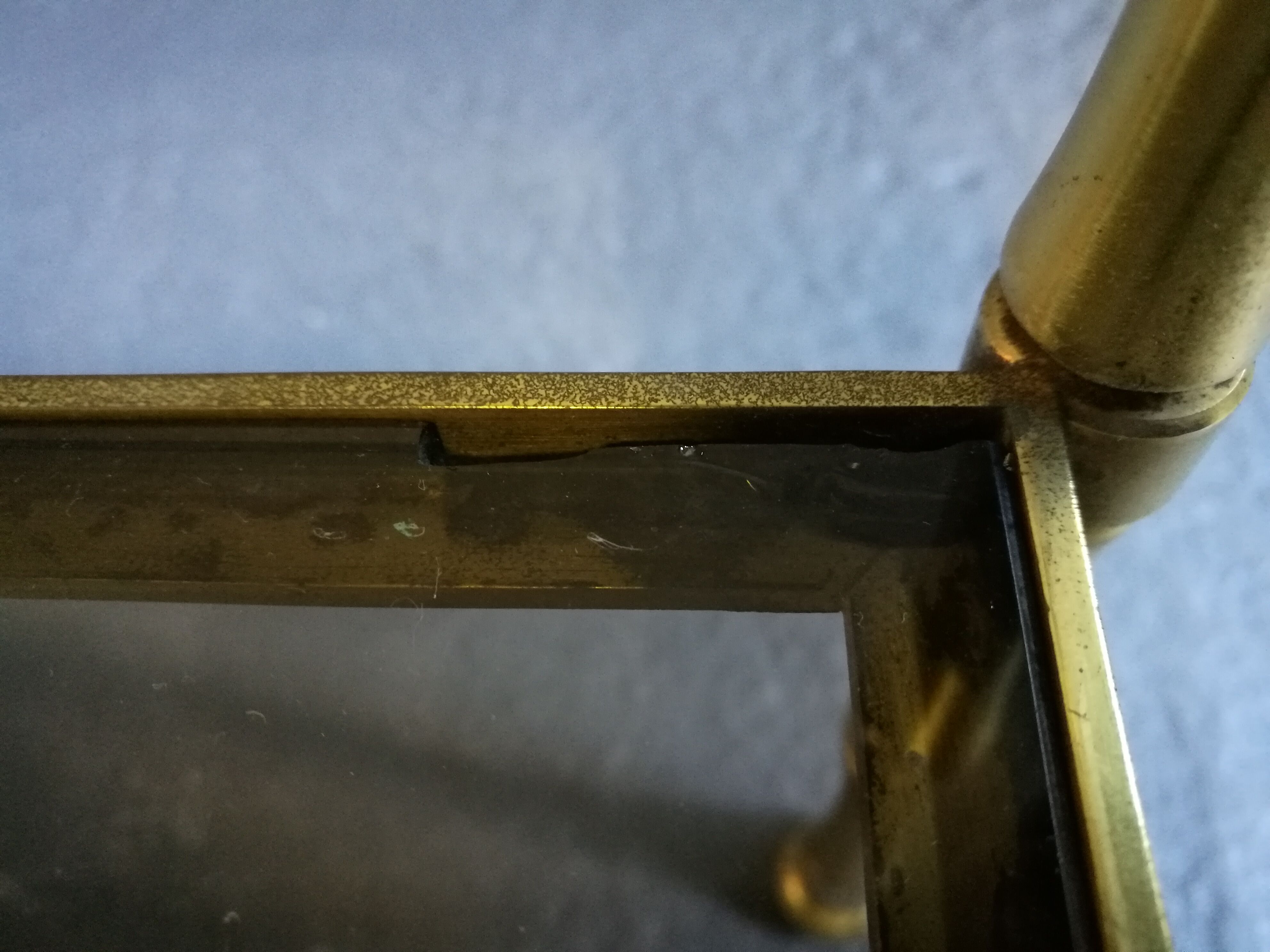 Smoked low years 70 brass and glass table