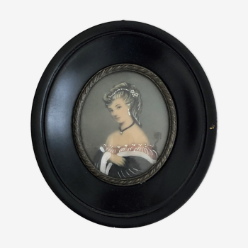 Portrait of a miniature young woman