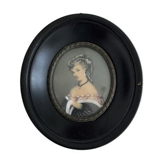 Portrait of a miniature young woman