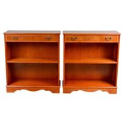 Pair of light walnut bookshelves with inlays and adjustable shelves.