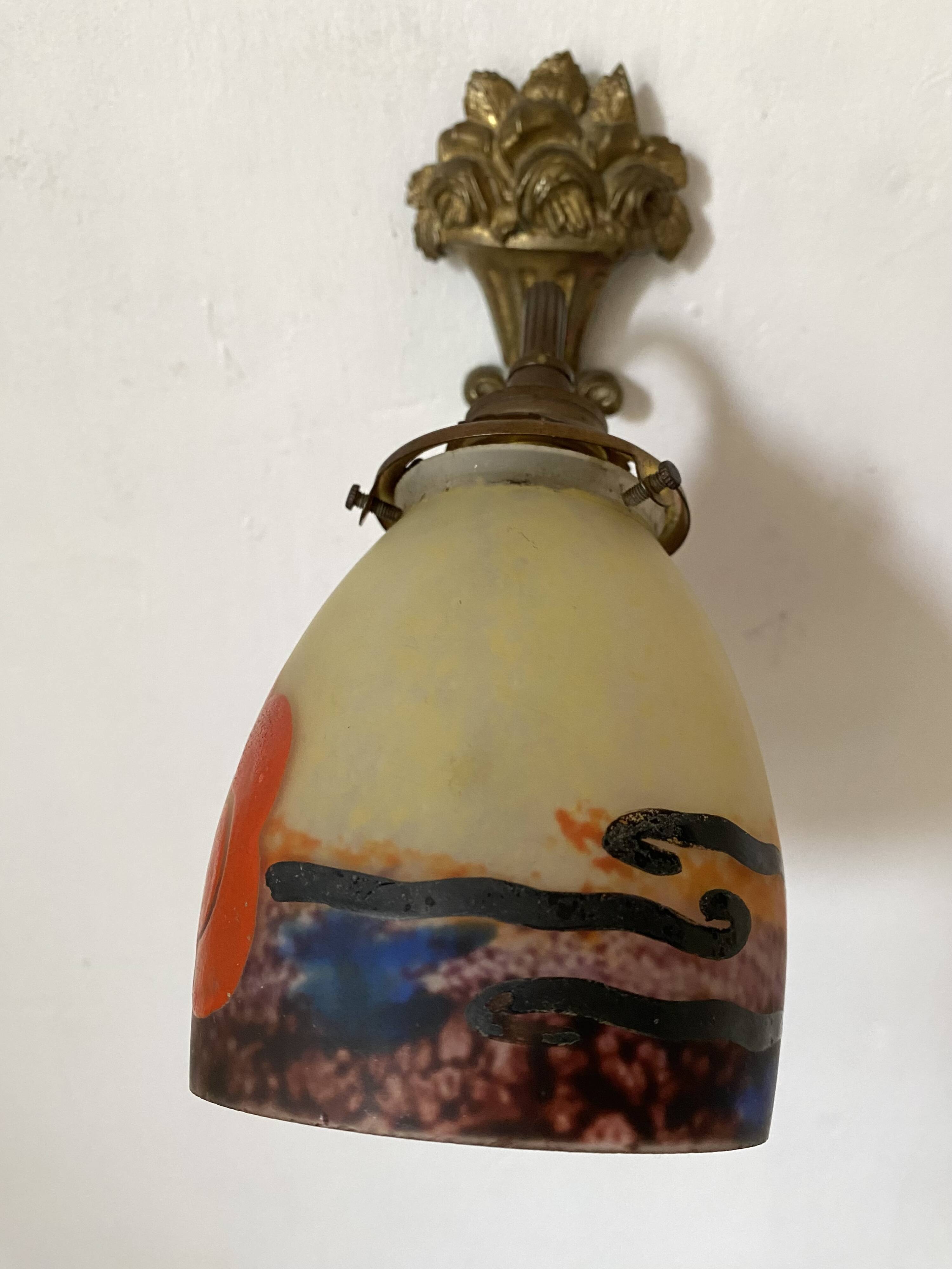 Antique bronze and glass paste wall light