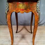Louis XV table in red marquetry