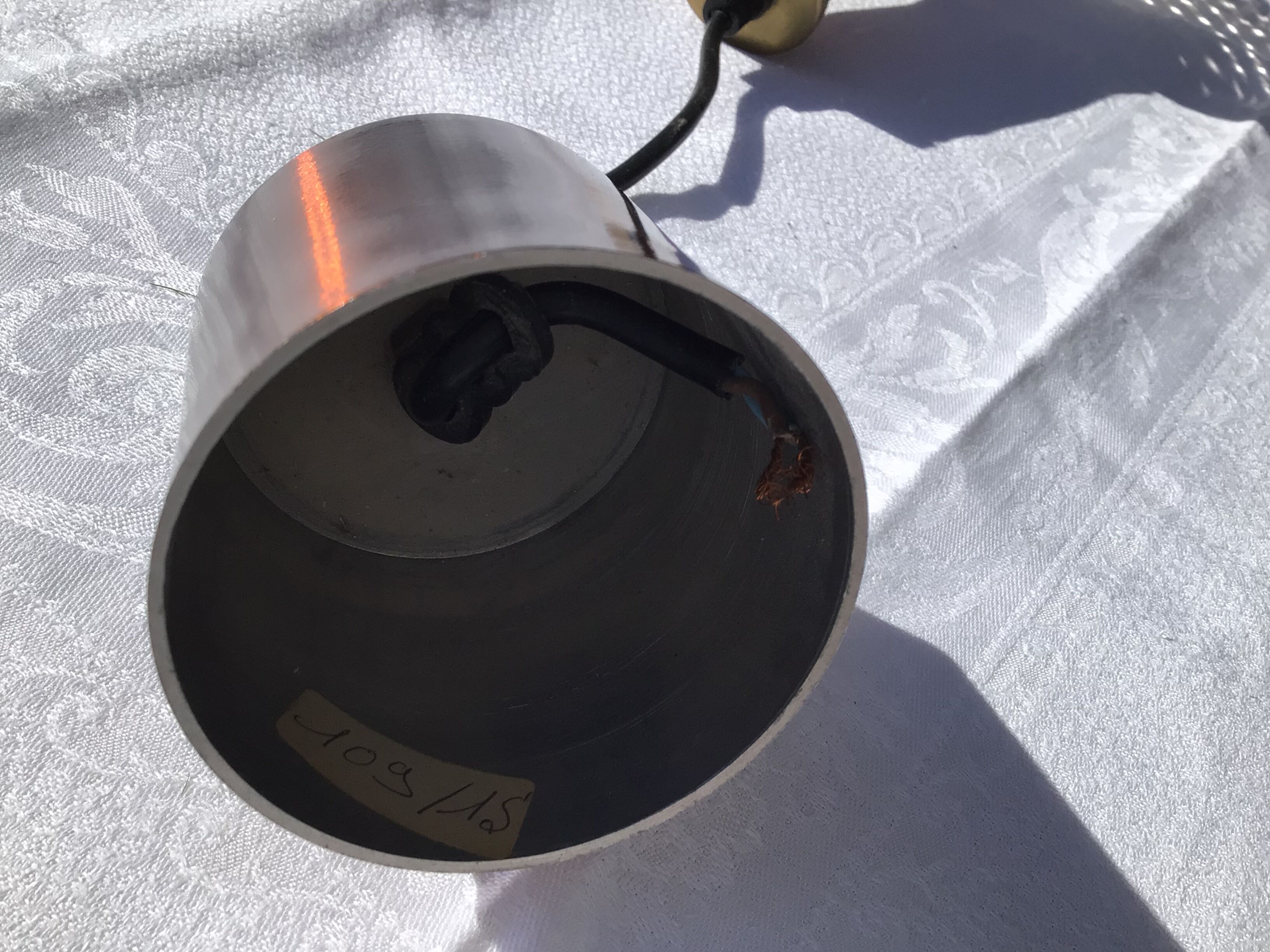 Copper suspension with white striped blown glass